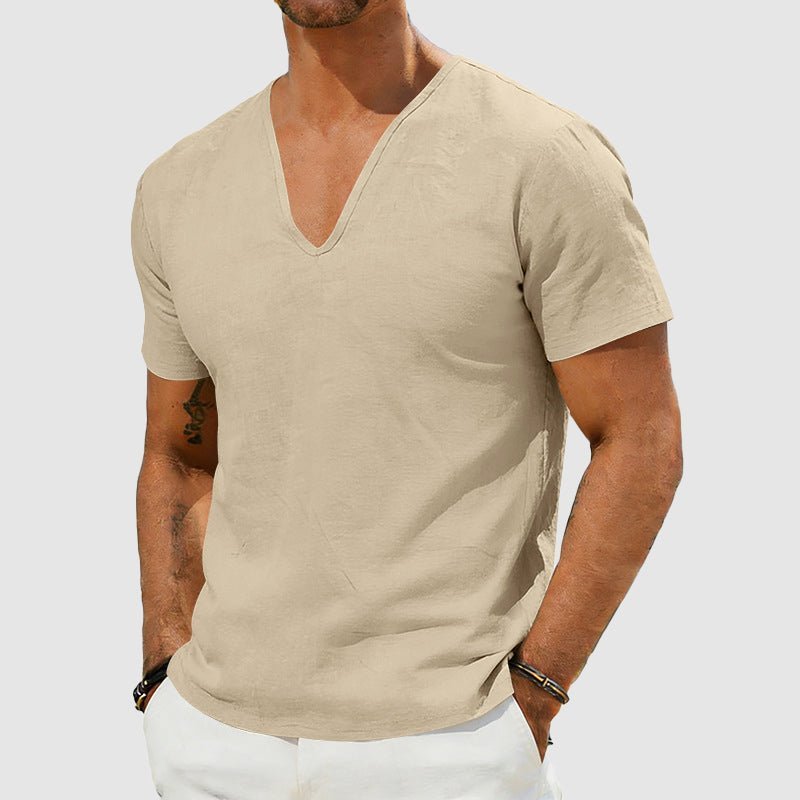 Men's Declan short sleeve linen V-neck shirt in a light beige color, worn by a model.