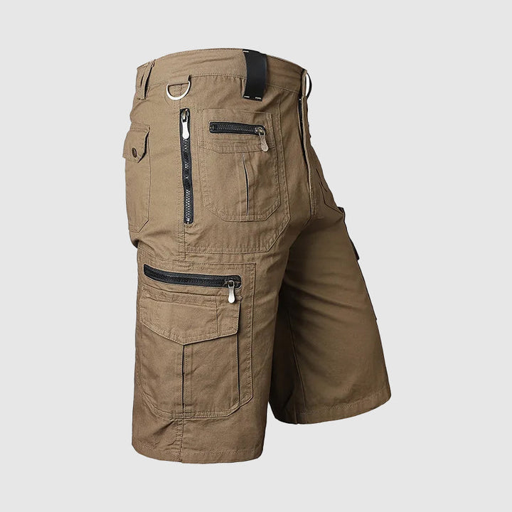 Dominic men's brown cargo shorts with multiple zipper pockets, knee-length cut, and utility-inspired style.