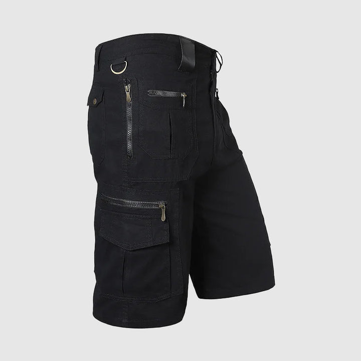 Men's black Dominic zipper cargo shorts with multiple utility pockets and knee-length cut.