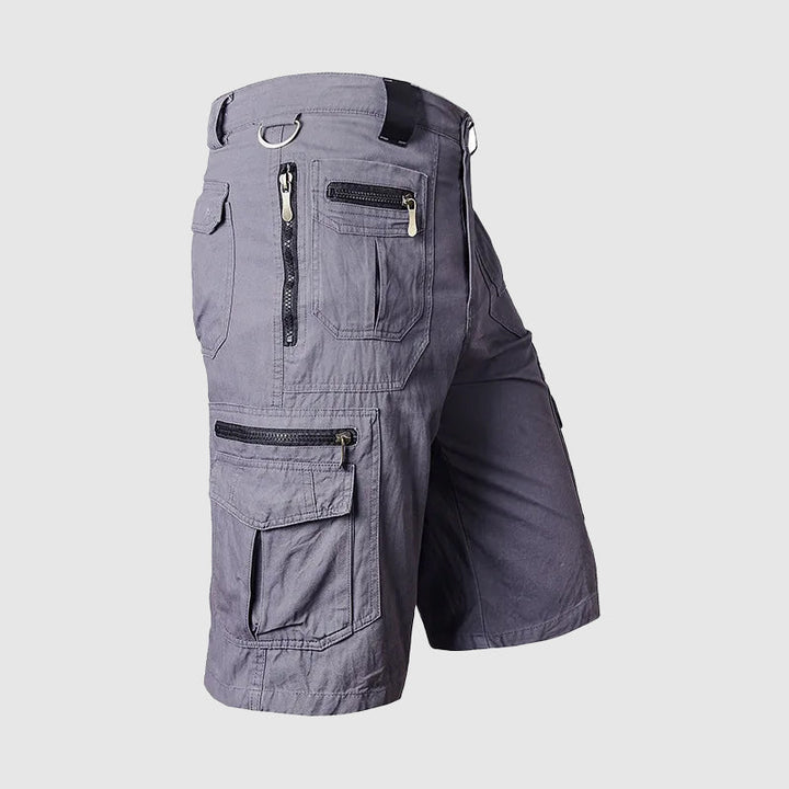 Men's gray Dominic cargo shorts with multiple zipper and flap pockets, knee-length cut, and utility-inspired design.