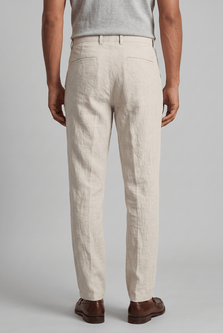 Men's Drew slim fit linen chinos in a light beige, featuring back welt pockets and a relaxed drape.