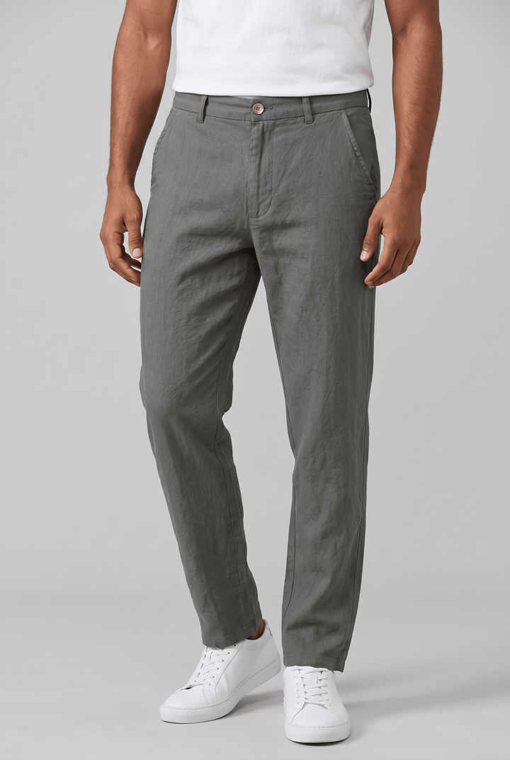 Men's Drew slim fit linen chinos in charcoal gray, featuring a flat front, side pockets, and a relaxed drape.