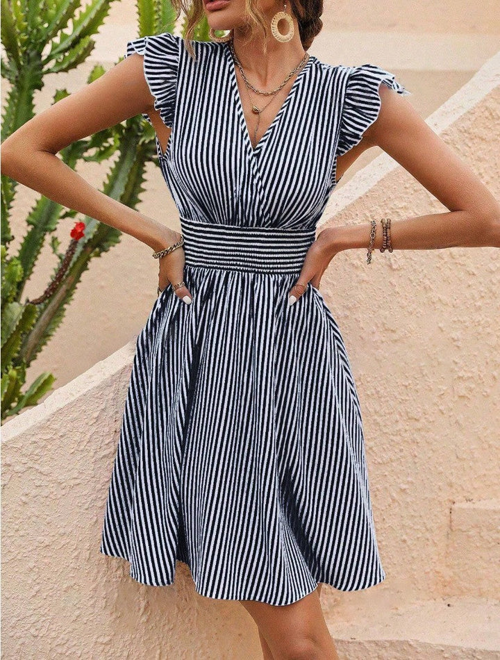 Elena women's striped flutter sleeve dress with a wrap-style V-neckline and smocked waist.