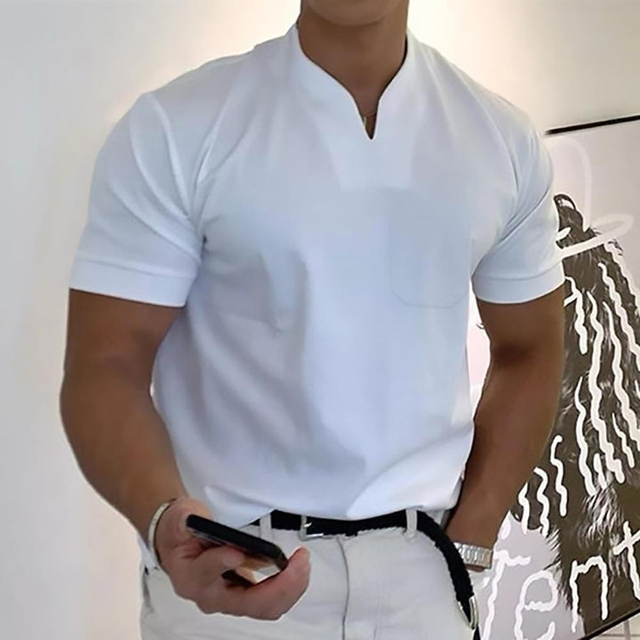 Men's Ethan classic white polo shirt with a neat buttonless placket, clean fit, and waist-length hem.