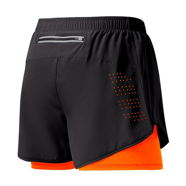Grant men's black 2-in-1 athletic shorts with a vibrant orange inner liner, reflective back pocket, and side ventilation.