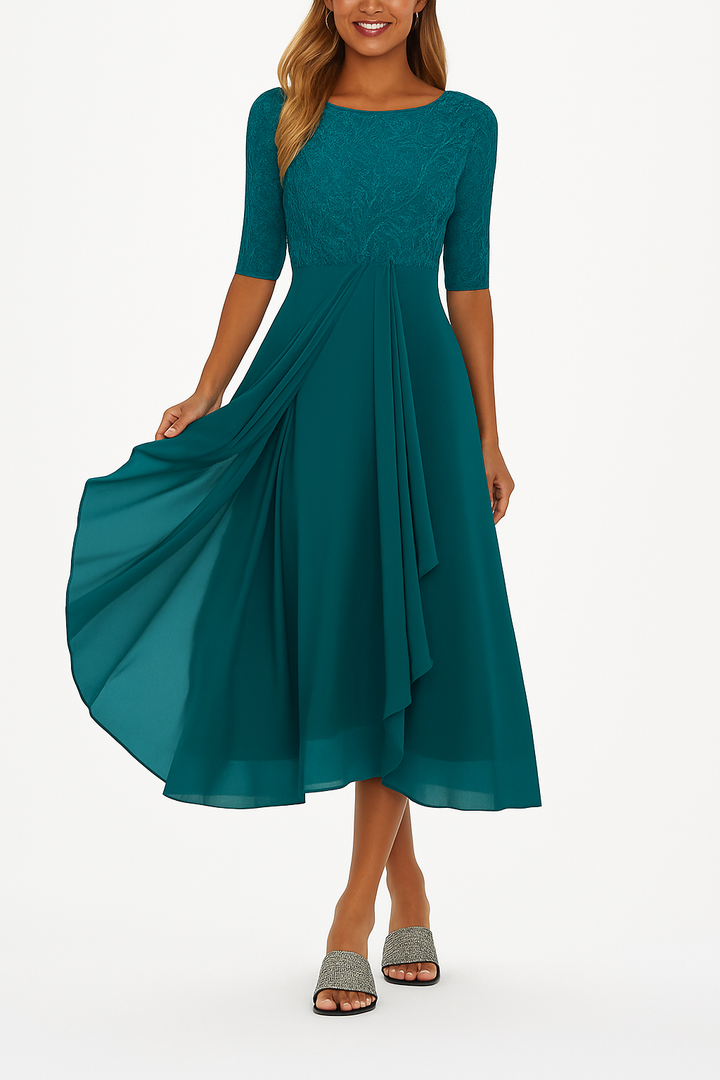 Greta women's teal lace A-line midi dress with sheer half sleeves and flowing skirt.