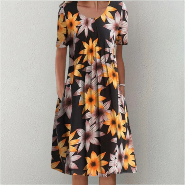 Orange floral midi dress with pockets and short sleeves for women.