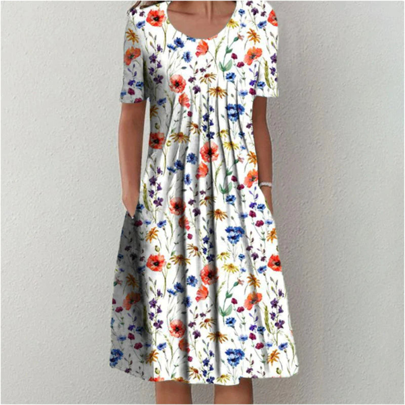 Red floral midi dress with pockets, short sleeves, and a flattering fit.
