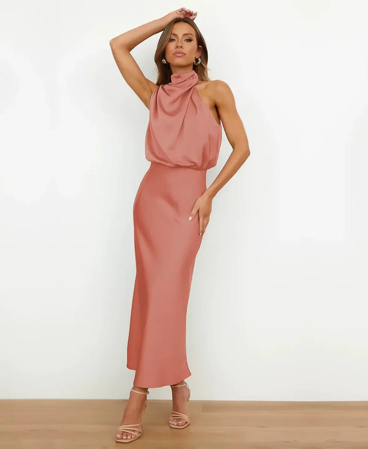 Women's Harper satin halter midi dress in polished rose gold, featuring a graceful neckline and luxe sheen.