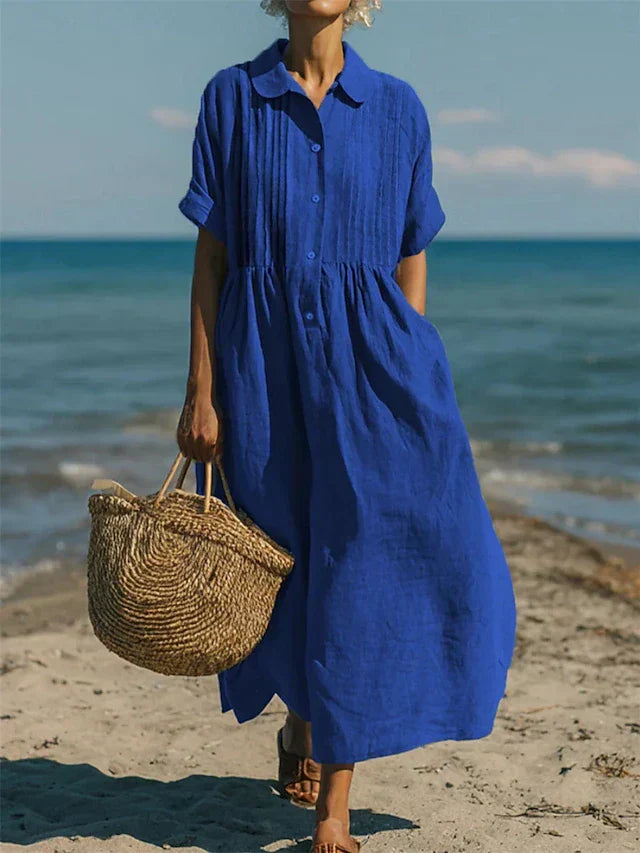 Hazel women's collared button midi dress in vibrant blue, featuring a relaxed, airy silhouette and pleated details.