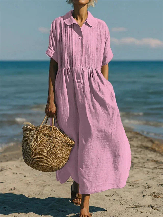 Hazel women's collared button-front midi dress in pink linen, with pleated details and a relaxed silhouette.