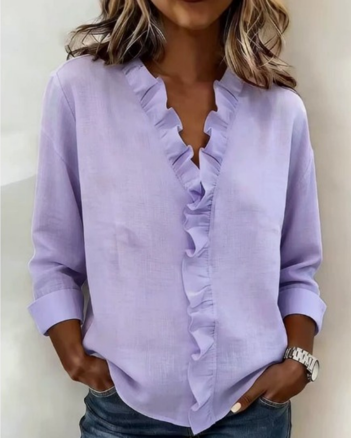 Purple V-neck ruffle blouse with long sleeves for women.