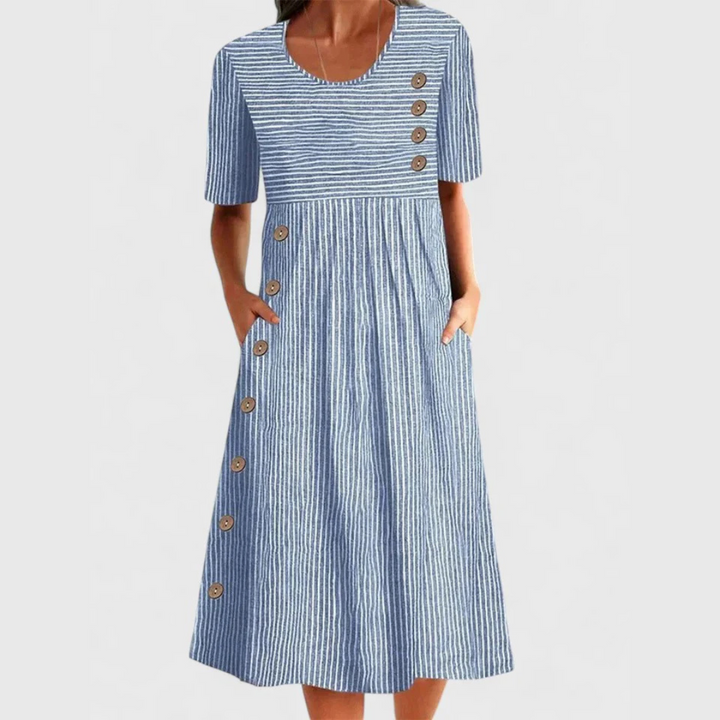 Isla women's blue and white striped midi dress with 3/4 sleeves, decorative buttons, and pockets.