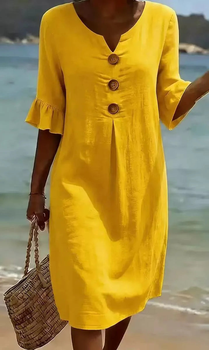 Yellow linen V-neck midi dress with ruffle sleeves and decorative buttons.