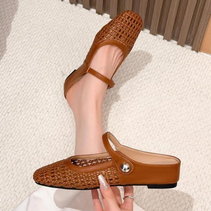 Women's Katerina black woven mule flats with orthopedic support and a Mary Jane strap.