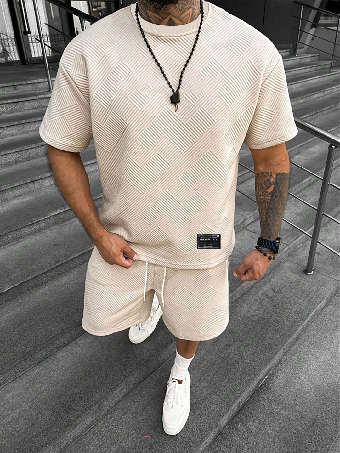 Men's Landon textured beige t-shirt and drawstring shorts set with a subtle tonal pattern.