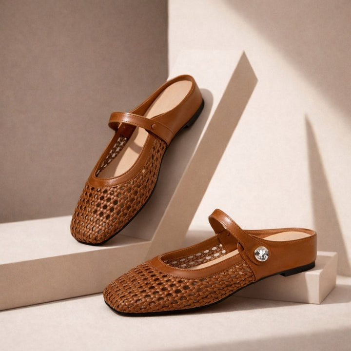 Brown woven leather Mary Jane flat mules with a slip-on design and decorative button strap.