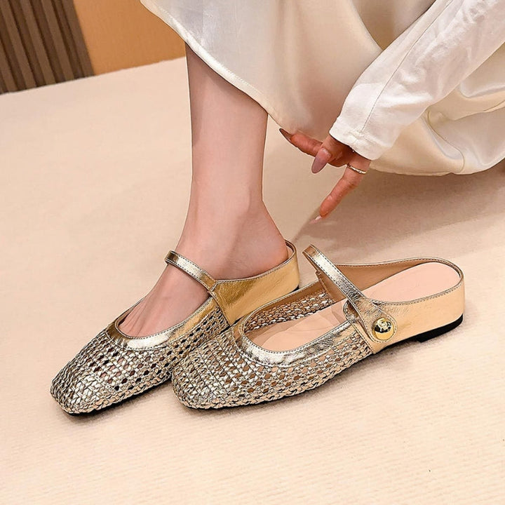 Gold woven flat slip-on Mary Jane mules with a metallic finish and a single strap.