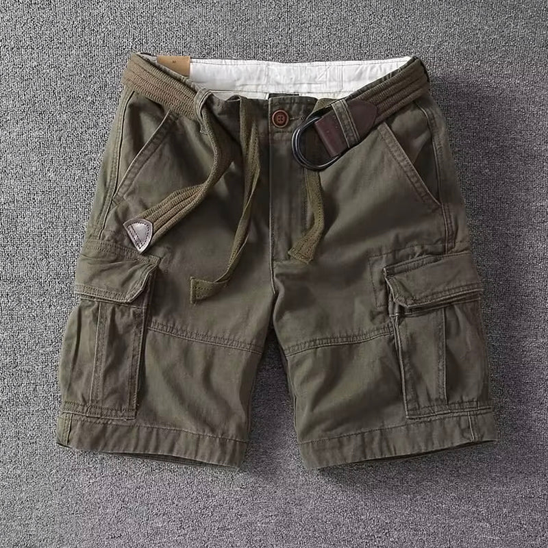 Men's Logan olive green cargo shorts with a brown belt, button-front waist, and utility pockets.