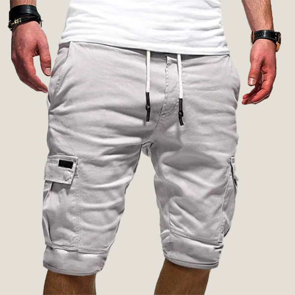 Men's light gray drawstring cargo shorts with knee-length cut and visible side pockets.