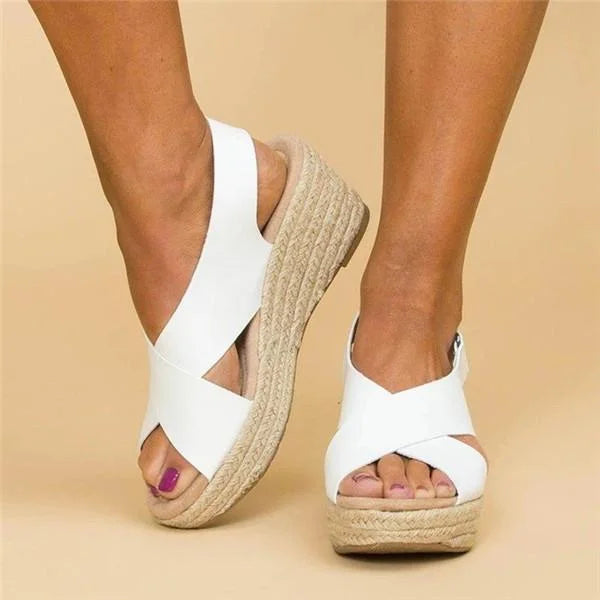 Beige women's orthopedic wedge sandals with a cushioned footbed and adjustable straps.