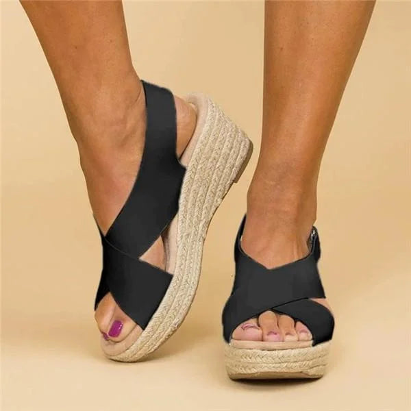 Black women's orthopedic wedge sandals with a cushioned footbed and adjustable strap.