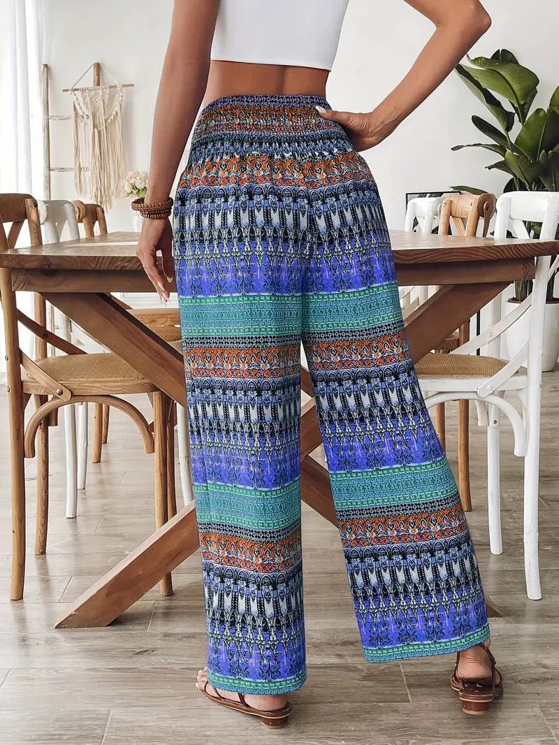 Women's Lyra boho print wide leg pants with a colorful multicolor design and drawstring waist.