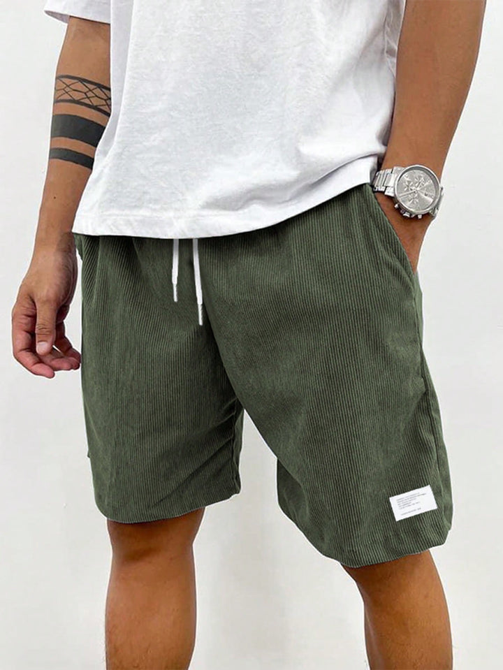 Men's Mason olive green corduroy drawstring casual shorts with a relaxed fit for easy summer style.