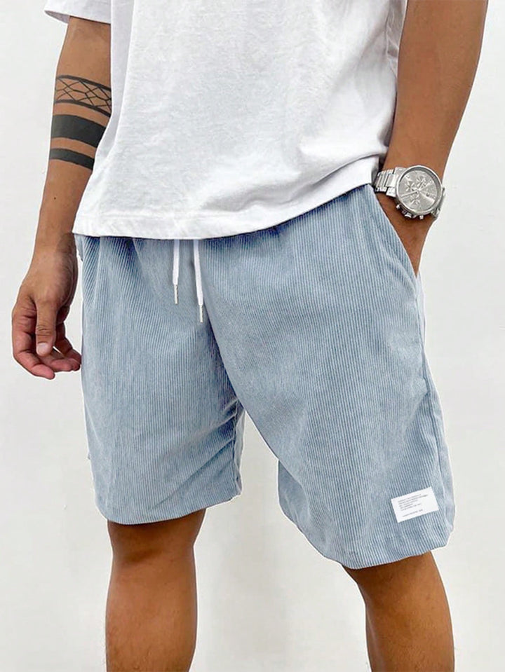 Men's Mason light blue corduroy drawstring shorts with a relaxed fit for easy summer style.