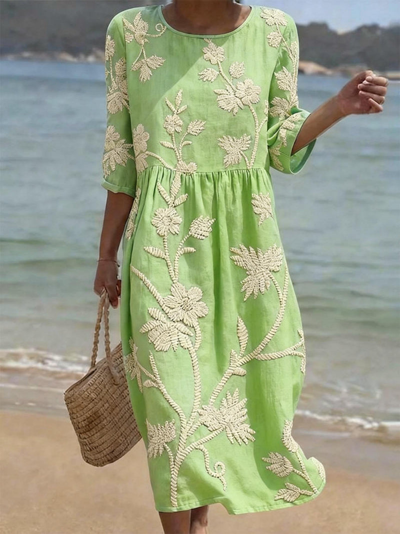 Mia women's floral round neck midi dress in light green with delicate white embroidery, perfect for summer.