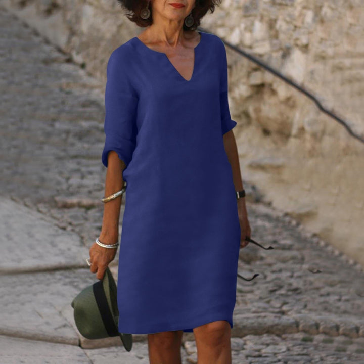 Mia women's summer dress in a flattering navy blue, featuring a clean silhouette and lightweight fabric.