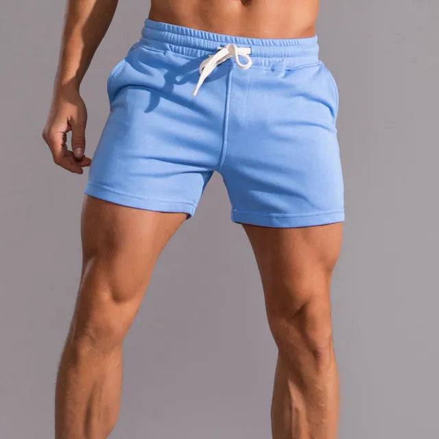 Miles men's slim fit drawstring shorts in light blue, featuring a soft weave fabric and mid-thigh cut.