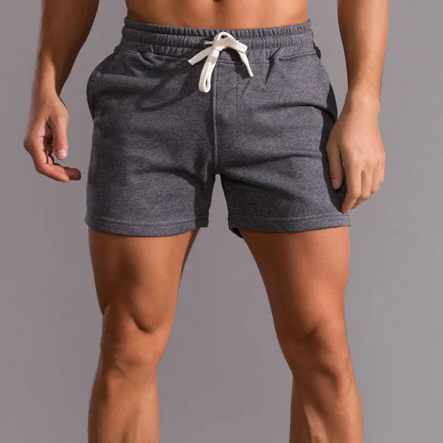 Men's Miles slim fit drawstring shorts in charcoal gray, featuring a soft weave and mid-thigh cut.
