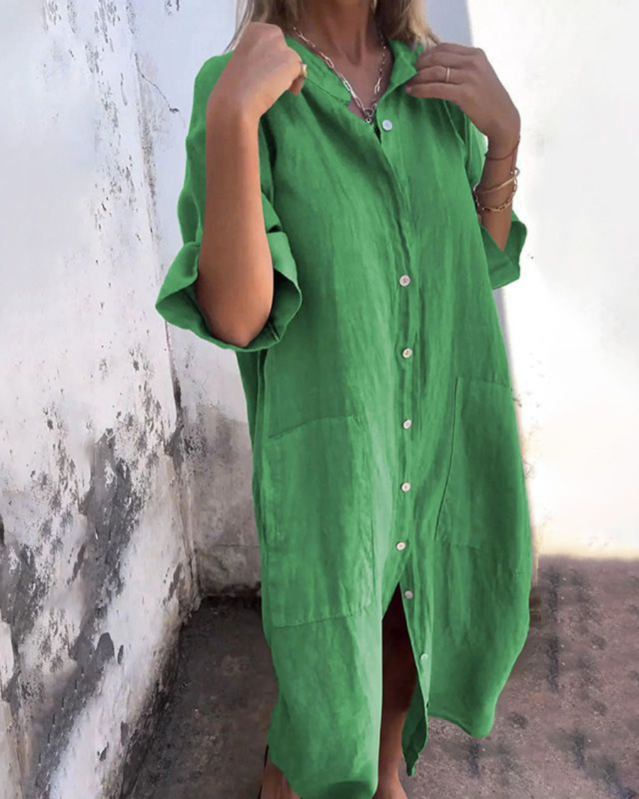 Mina women's plus size green shirt dress with button-front, rolled sleeves, and front pockets.