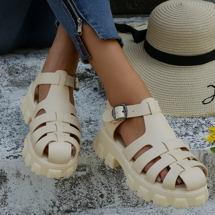 Beige Mira women's platform fisherman sandals with buckle strap.