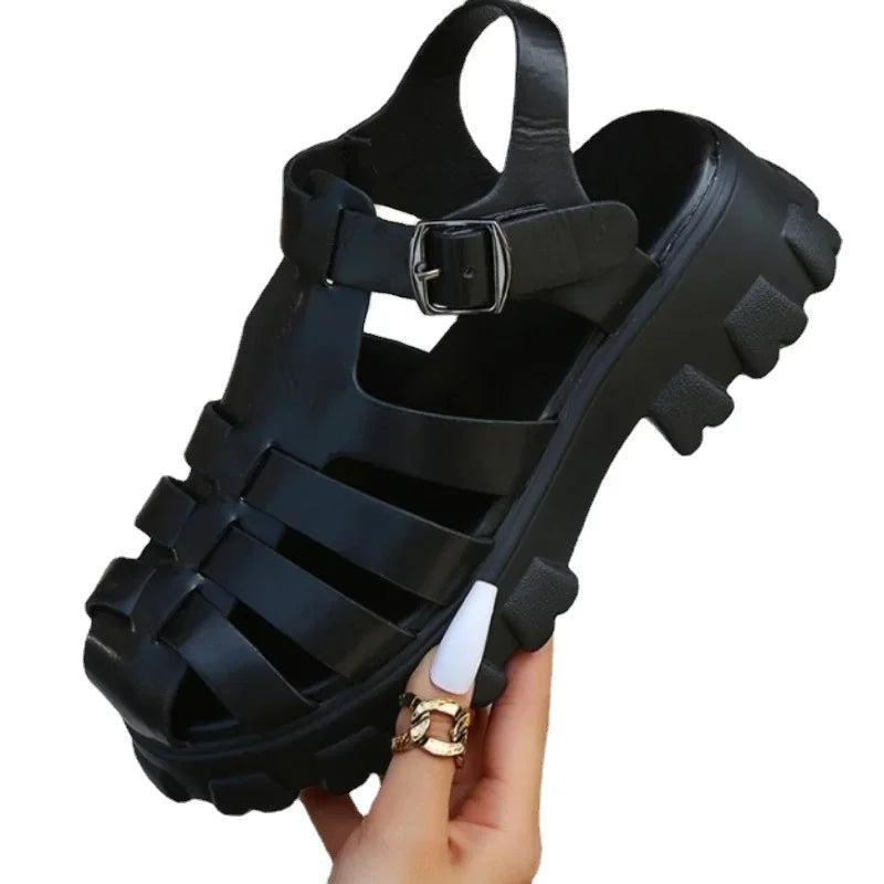Black Mira women's platform fisherman sandals with buckle strap.
