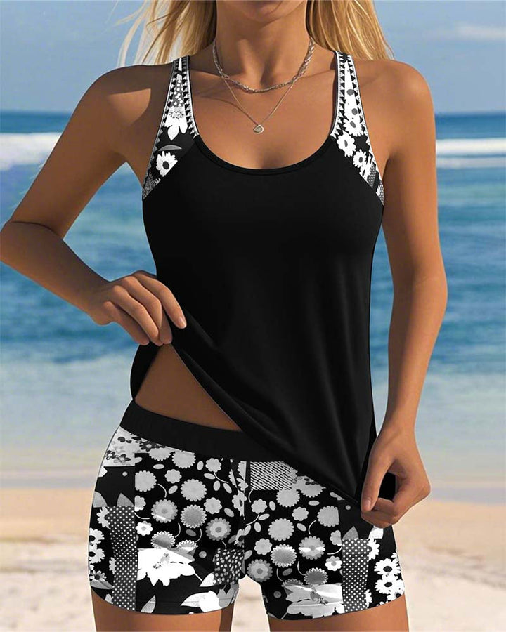 Women's Mirelle floral print tankini with black shorts, a stylish and comfortable two-piece swimsuit.