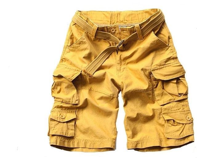 Men's Nolan camo belted cargo shorts in a bold yellow camouflage print with practical side pockets.