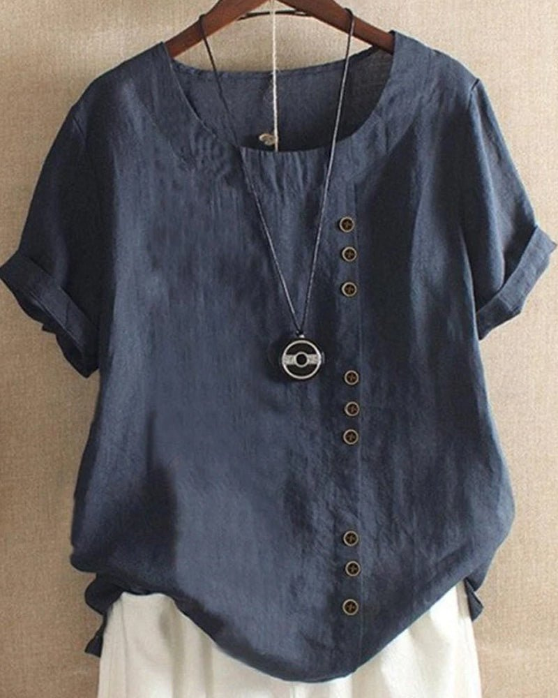 Navy blue linen tunic top with a relaxed fit, short rolled sleeves, and an asymmetrical button-front detail.