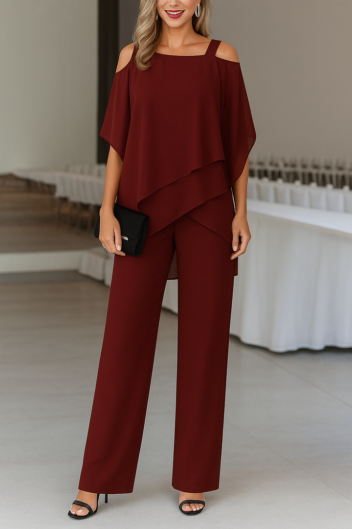 Women's Odessa cold shoulder wide-leg jumpsuit in burgundy with a draped overlay.