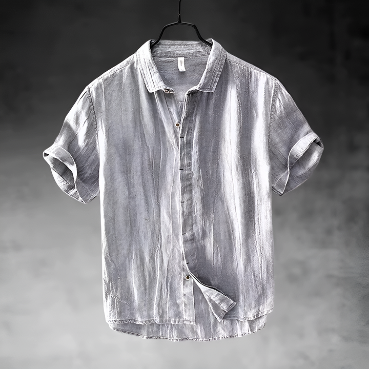 Men's Paulino light gray short sleeve button-up shirt with a textured appearance and collared neckline.