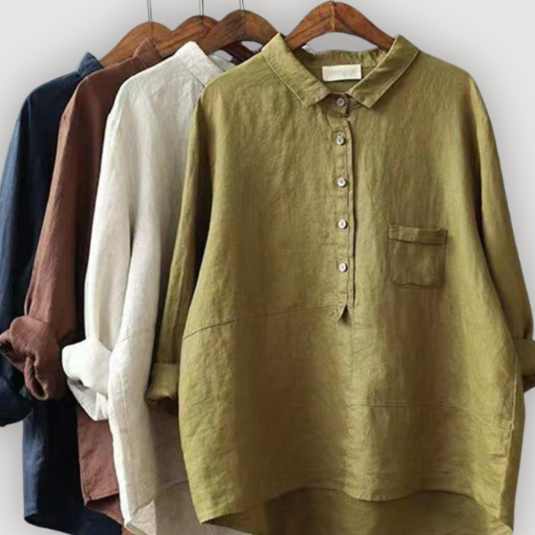 Rosalie relaxed linen blouses in olive green, beige, brown, and navy hanging on wooden hangers.