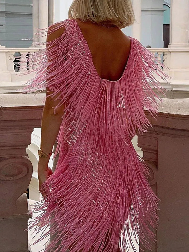 Back view of the pink Sienna fringe party dress with shimmering sequins and a low back.
