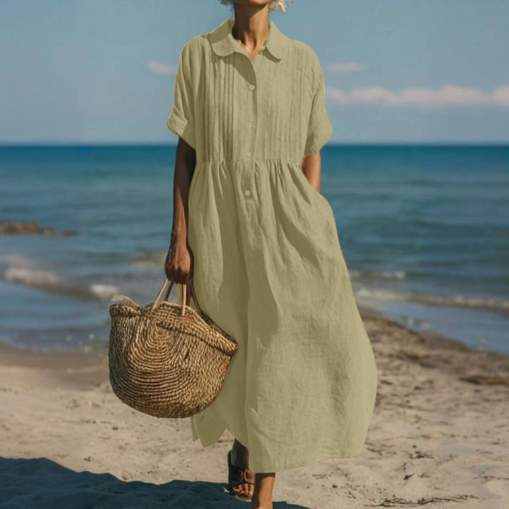 Stella women's collared button midi dress in soft, breathable sage cotton, with a relaxed fit and button-front design.