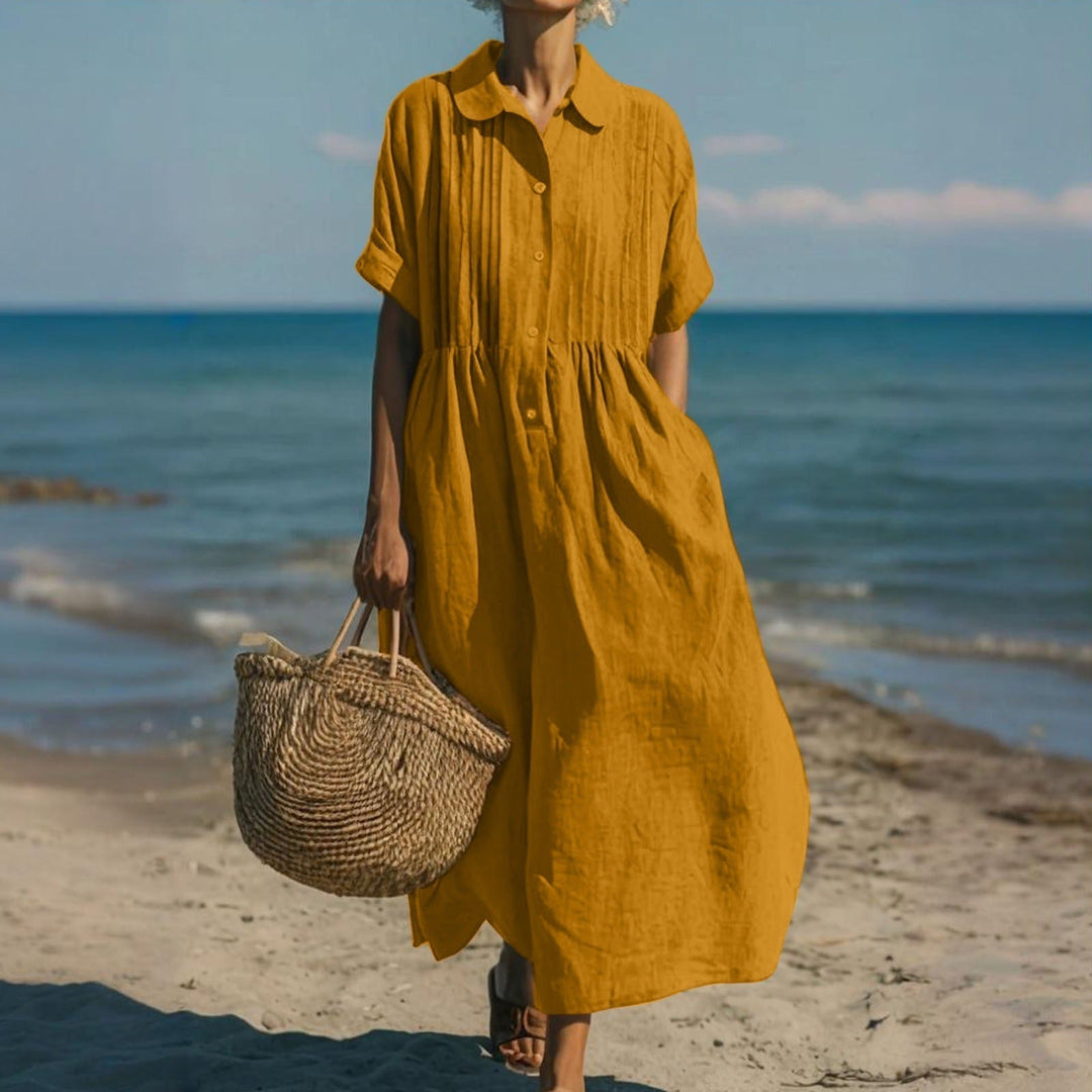 Stella women's collared button midi dress in soft, breathable mustard cotton, perfect for warm, laid-back days.