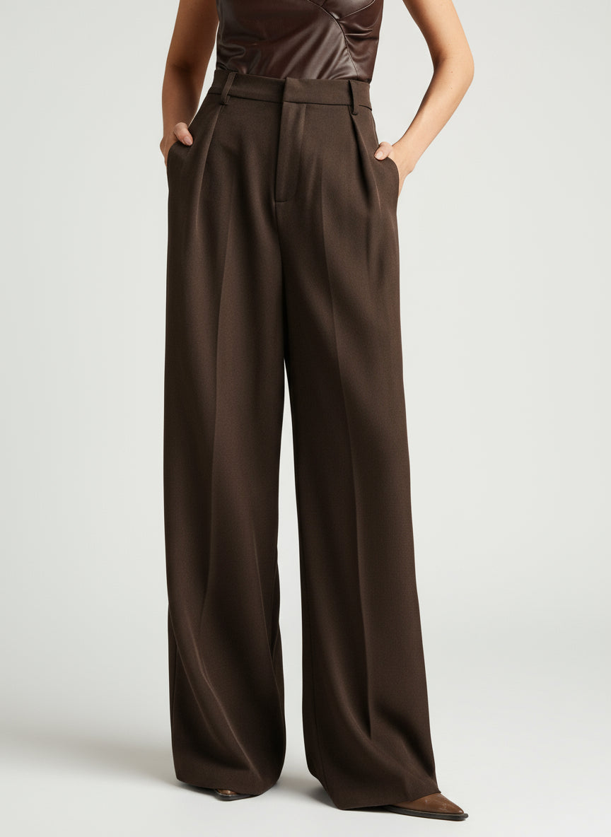 Stella women's high-waist wide-leg pants in dark brown, featuring tailored construction and a flowing silhouette.