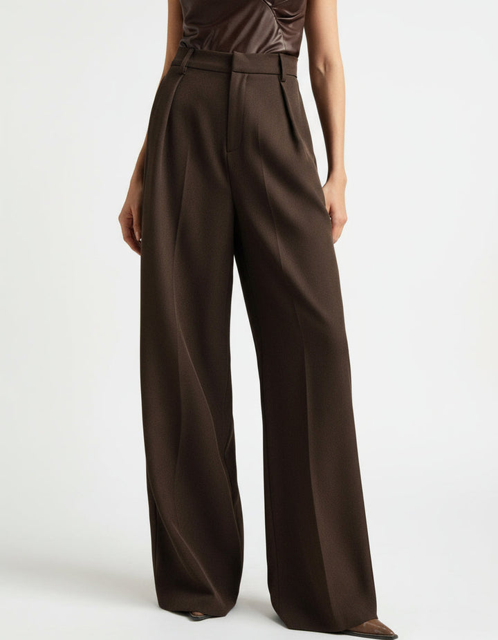 Stella women's high-waist wide-leg pants in rich brown, featuring refined tailoring and a flowing silhouette.