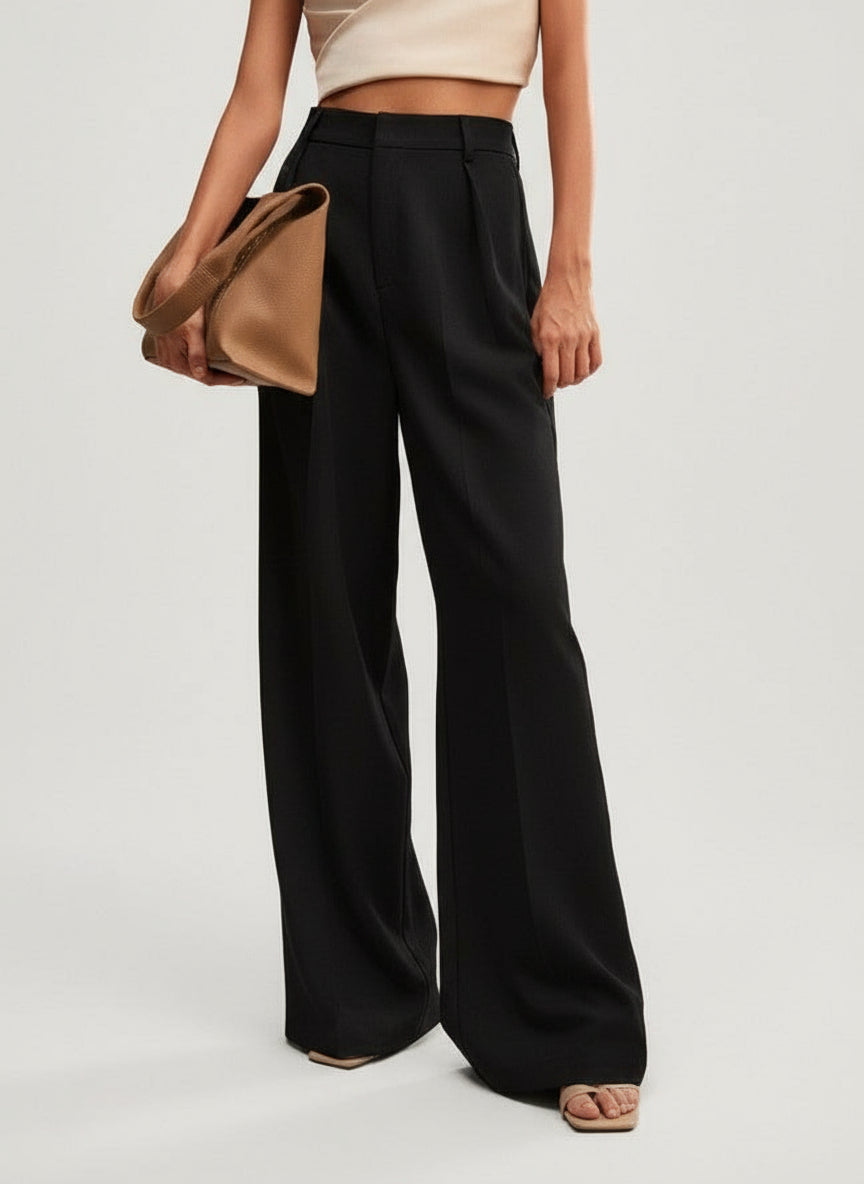 Stella black high-waist wide-leg pants with tailored lines, offering a sleek, confident look.