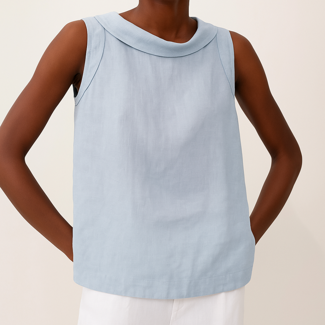 Light blue sleeveless top featuring a modern roll collar and a soft, draped linen-blend fabric.