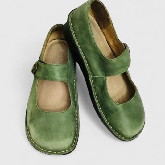Green leather Talia orthopedic Mary Jane shoes with adjustable straps and visible stitching.